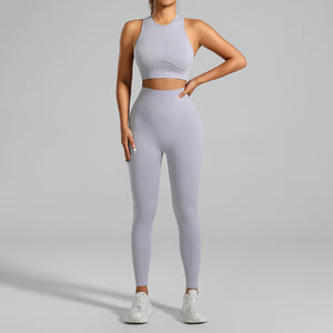 Detail of quick-dry high-waist yoga leggings and crop top outfit