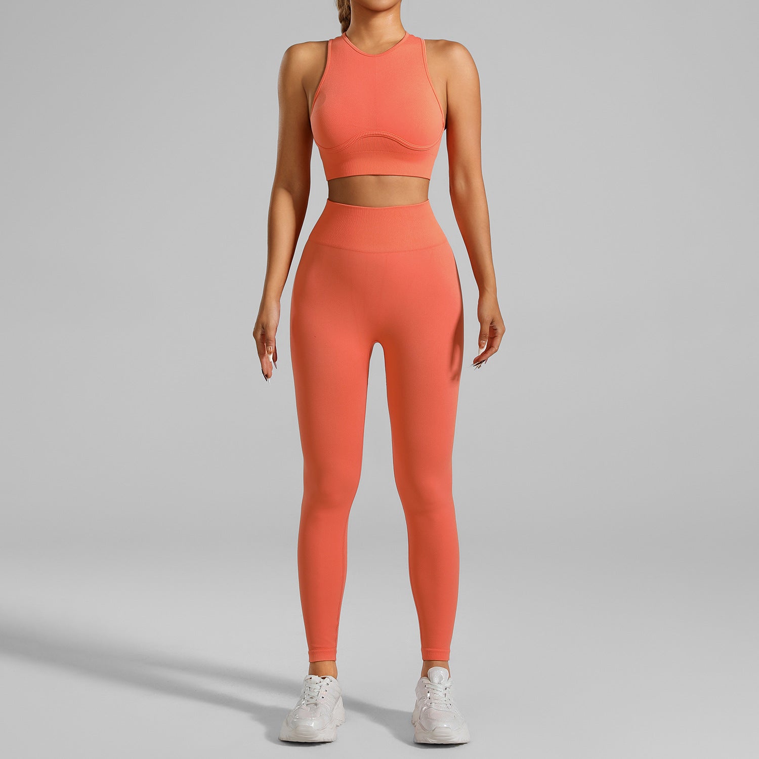 A woman figure, wearing a  Pink/Pink Tight-Fitting Yoga Set wear, with the front side being displayed
