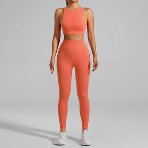 A woman figure, wearing a  Pink/Pink Tight-Fitting Yoga Set wear, with the front side being displayed
