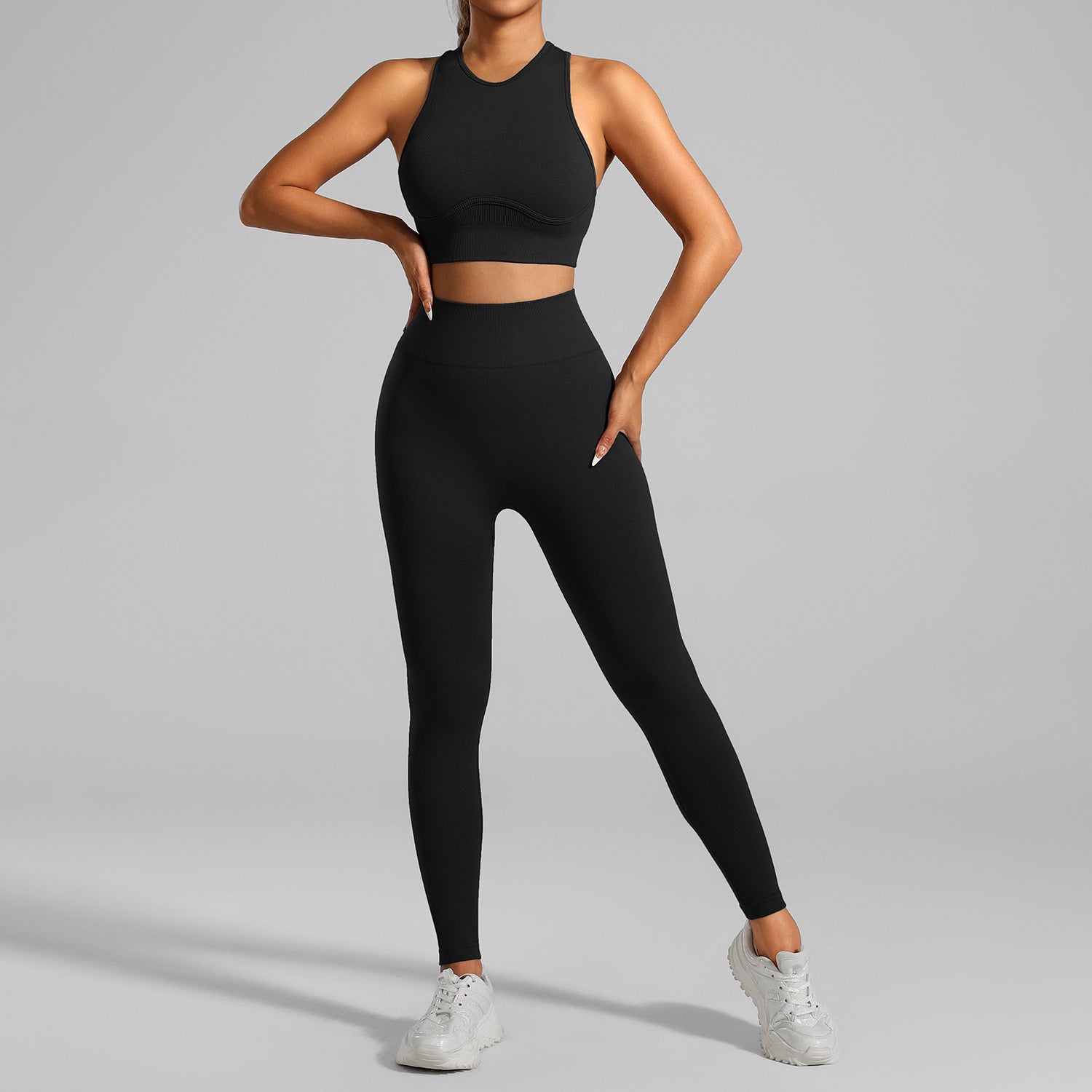 Detail of quick-dry high-waist yoga leggings and crop top outfit