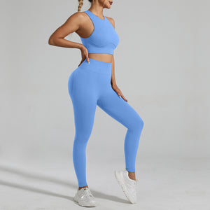 A woman figure, wearing a  Light Blue-Fitting Yoga Set