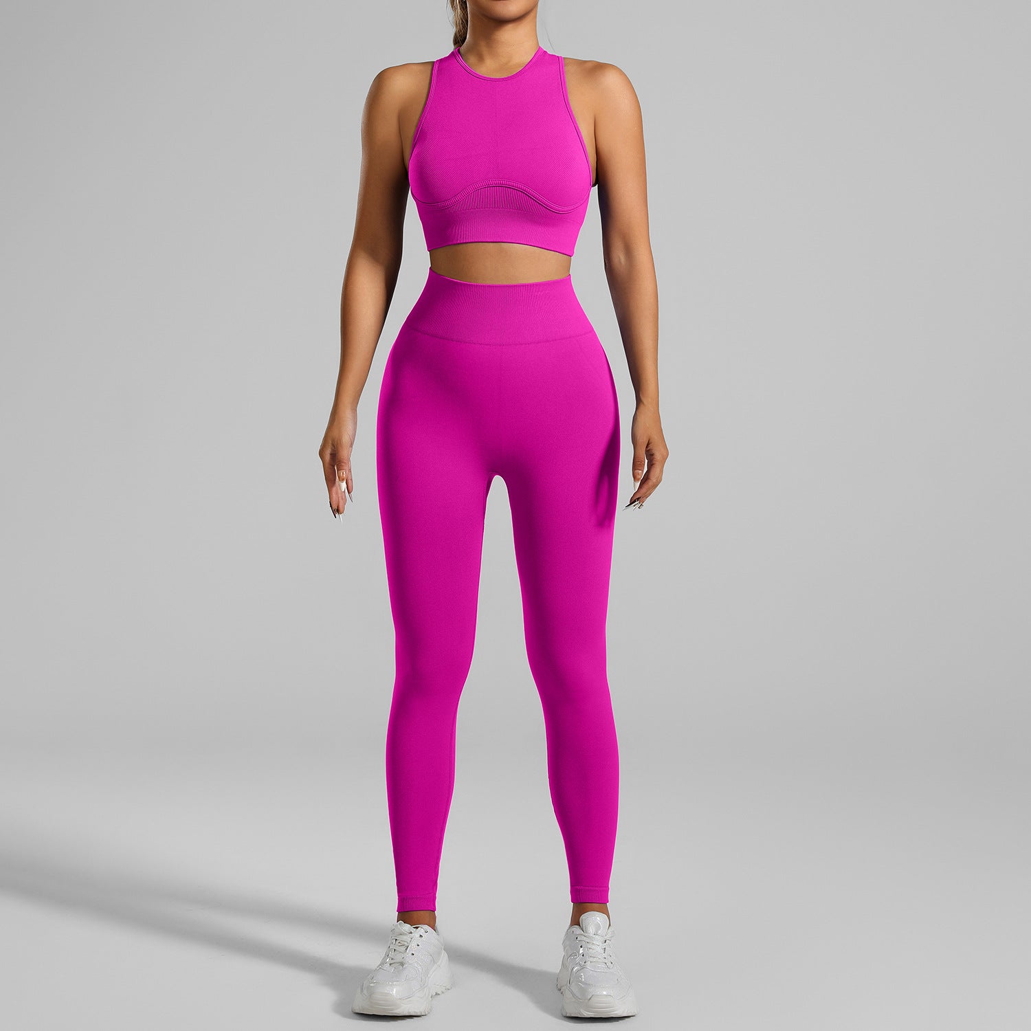 Detail of quick-dry high-waist yoga leggings and crop top outfit